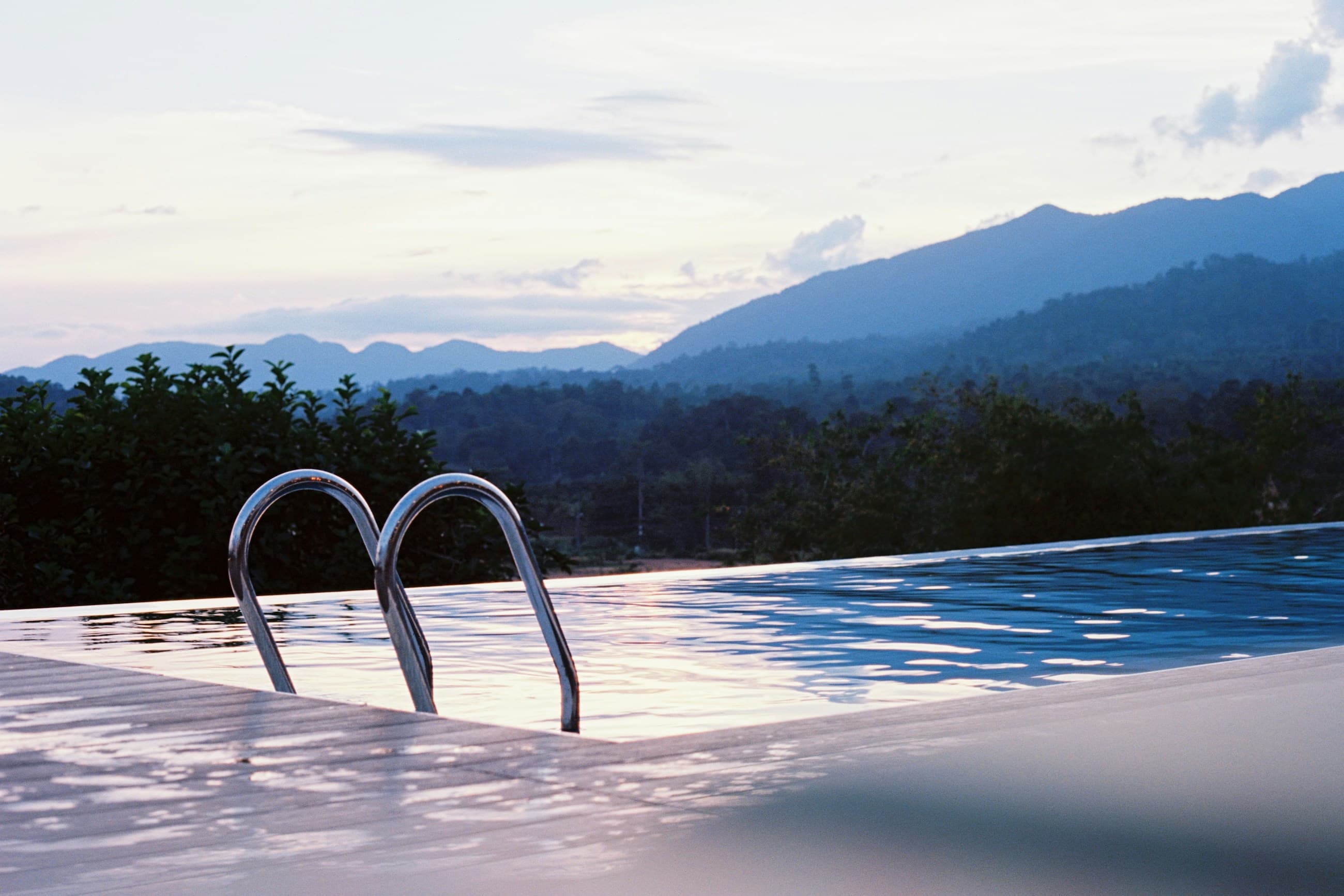 Infinity pool overlooking the Aegean at sunset